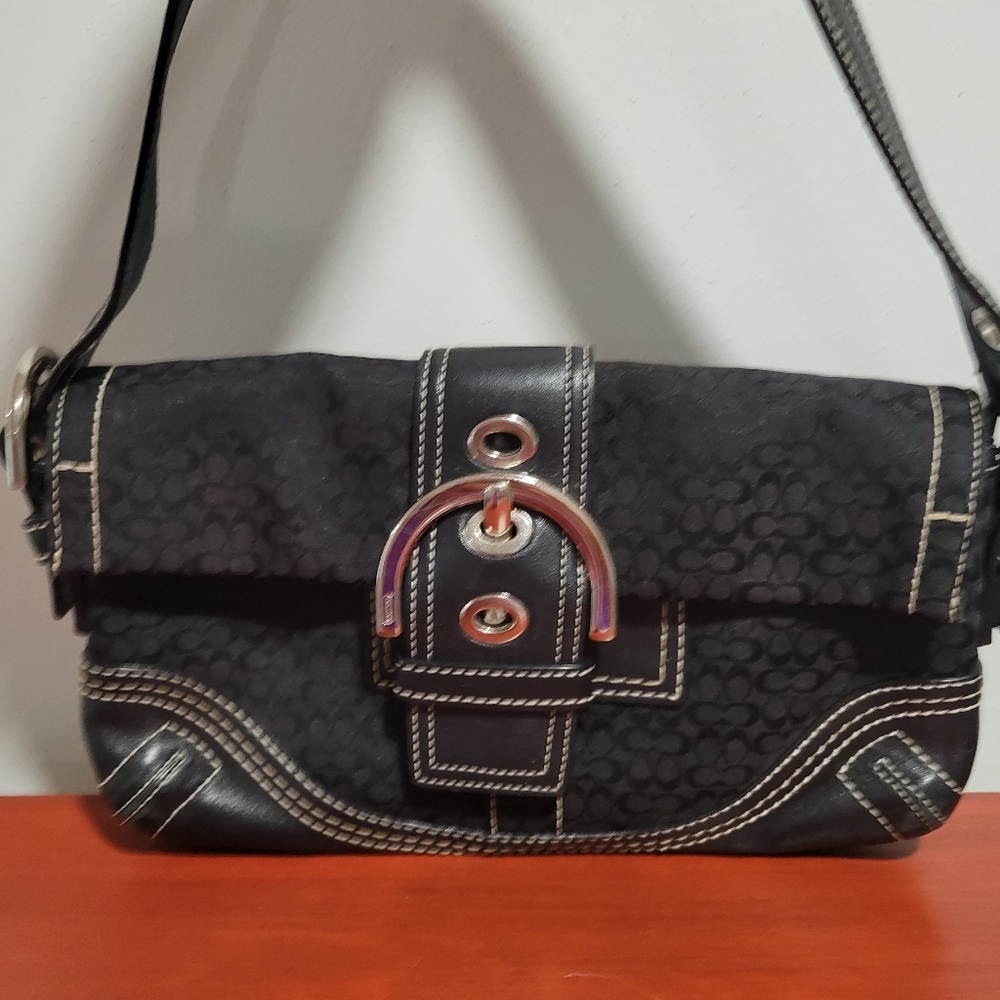 Coach purse with duster bag